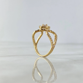 Anillo Solitario Abrazo Curvo | Oro Amarillo | 2.45gr | T5 3/4 | Circones Blancos