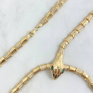 Cadena Serpiente Escamada | Oro Amarillo +4 | 32.55gr | 50cm | Circones Blancos Ojos Verdes