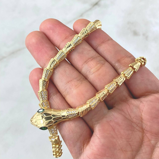 Cadena Serpiente Escamada | Oro Amarillo +4 | 32.55gr | 50cm | Circones Blancos Ojos Verdes