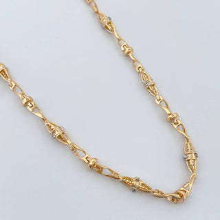 Cadena Dubai | Dos Oros Amarillo Blanco 18K | 30.65 g | 62.5 cm | 3.9 mm