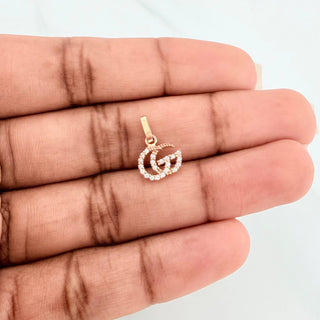 Dije GG | Oro Rosa 18K | 0.5 g | 1.4 cm